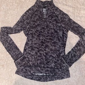 Lululemon black and white marbled 1/4 zip pull over.  Size 6